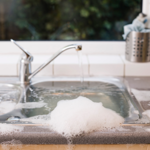 Overflowing kitchen sink